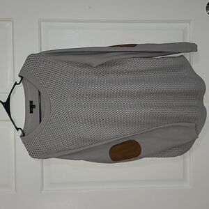 Gray patterned sweater with leather elbow detail